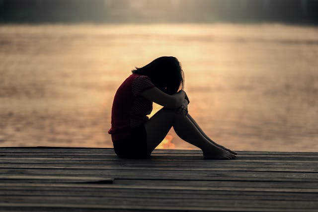 sad lady at the beach